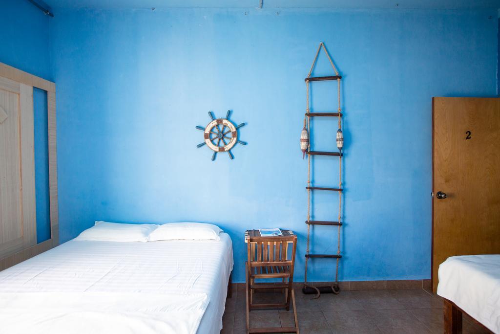 G.T. Guest House Garapan Pokoj fotografie