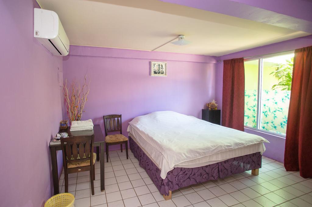 G.T. Guest House Garapan Pokoj fotografie